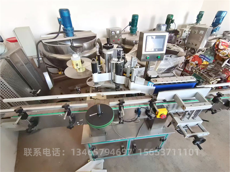 全自動(dòng)單面貼標(biāo)機(jī)1..jpg 全自動(dòng)單面貼標(biāo)機(jī)1..jpg