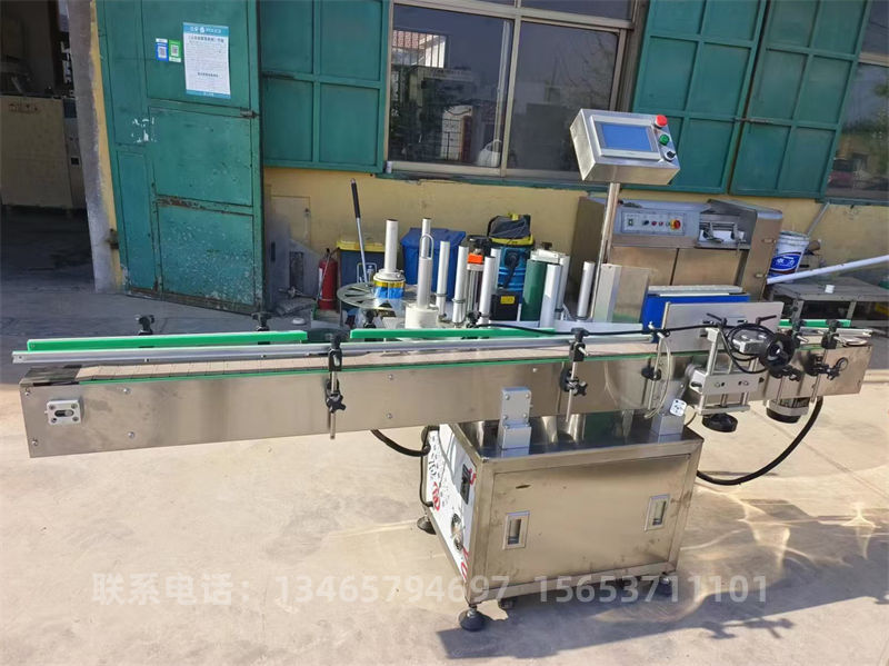 全自動(dòng)單面貼標(biāo)機(jī)1.jpg 全自動(dòng)單面貼標(biāo)機(jī)1.jpg