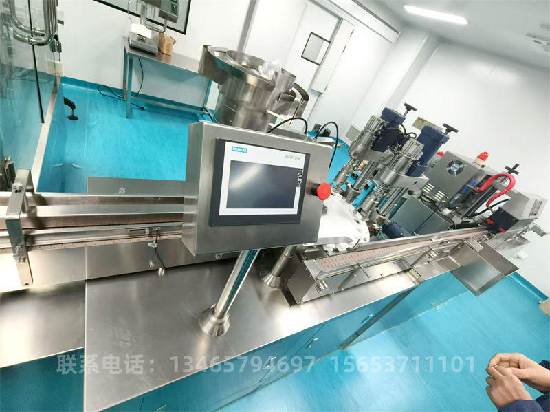 全自動灌裝一體機(jī).jpg 全自動灌裝一體機(jī).jpg